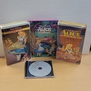 Alice in Wonderland vhs (2) 1 dvd movie, 1 book